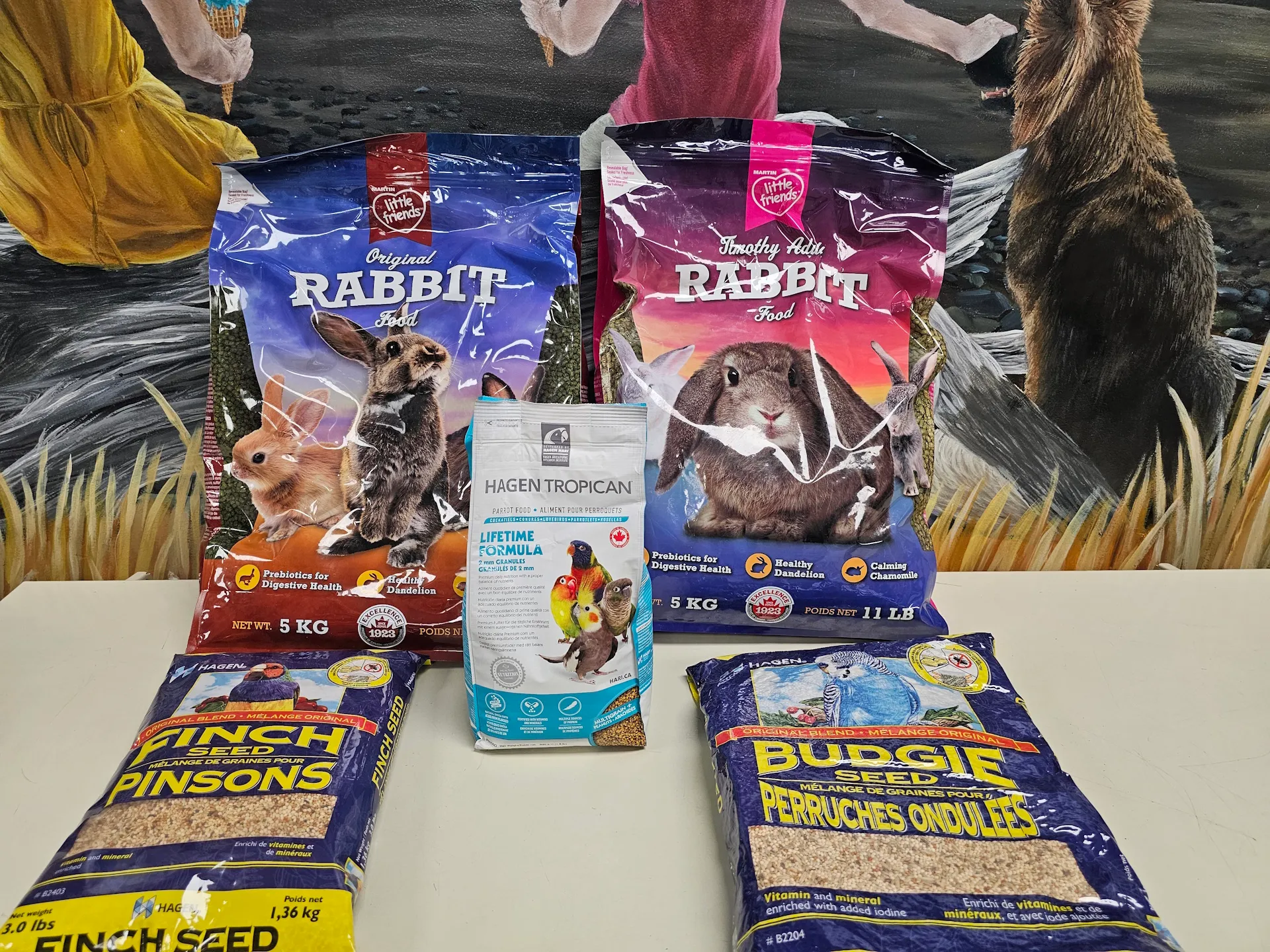 Colorful assortment of Martin Little Friends products on shelves at East Coast Pets